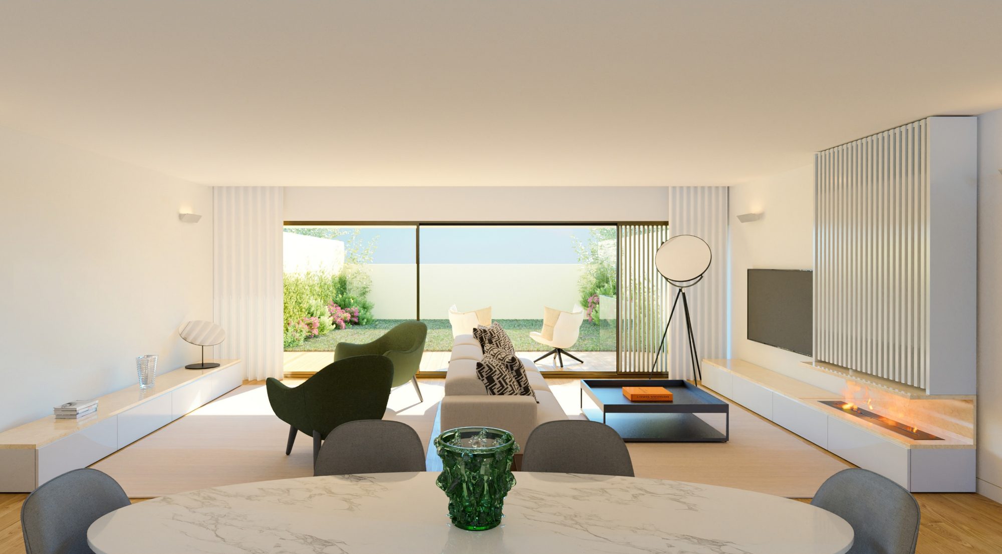 Sala de estar e jantar aberta para o jardim e para o rio